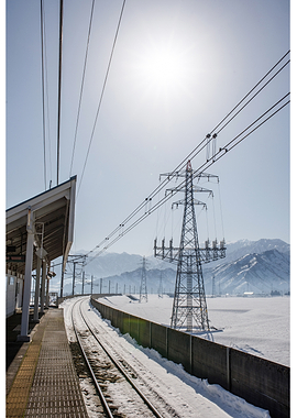 Snowy Train Station with Power Lines
