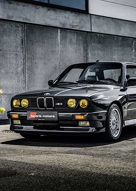 Black BMW M3 E30 with Yellow Headlights