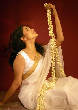 mamitha baiju in White Saree with Jasmine Garland
