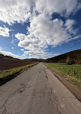 Open Road Through Autumn Landscape