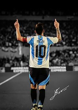 Lionel Messi celebrating with arms raised