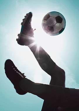 Soccer Player Kicking Ball