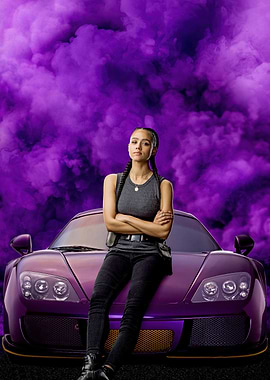 Nathalie Emmanuel leaning on a purple sports car