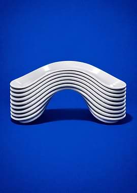 Stack of White Curved Plates