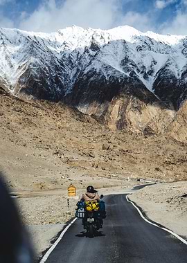 Motorcyclist on a mountain road