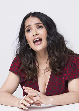 Salma Hayek in a red polka dot dress