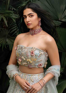 rukmini vasanth in traditional Indian attire with jewelry