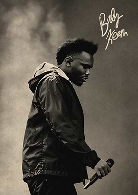 Baby Keem performing with microphone