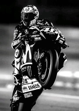 Motorcyclist performing a wheelie