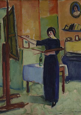 Artist painting in a studio