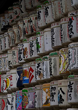 Stacked Sake Barrels with Japanese Calligraphy