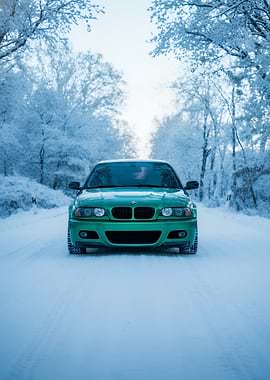 Green BMW in Snowy Forest