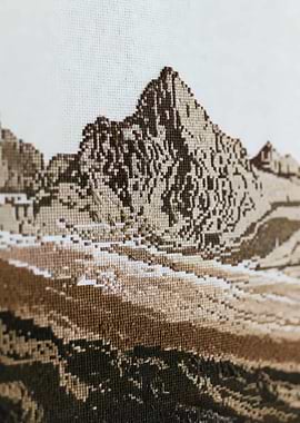 Cross-stitch mountain landscape