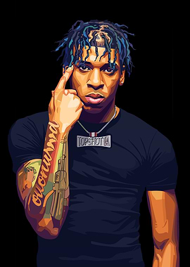 Rapper NLE Choppa with 'TOP SHOTTA' necklace