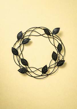 Black Leaf Wreath on Yellow Background