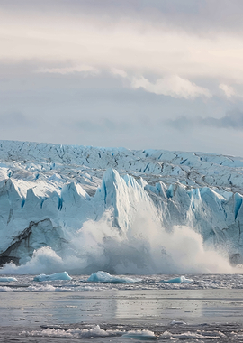 Glacier calving into the ocean