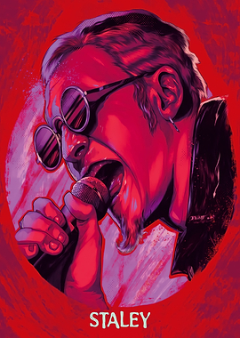 Staley singing into microphone