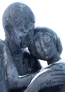 Bronze Sculpture of Embracing Couple in Snow