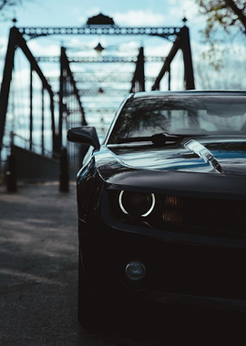 Black Camaro on a Bridge