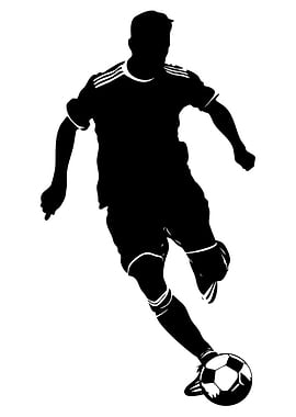 Silhouette of a soccer player kicking a ball