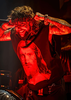 Man in Jesus T-shirt on stage