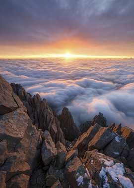 Sunrise Over Clouds from Mountain Peak