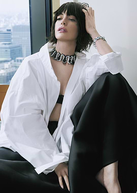 Model in White Shirt and Black Pants