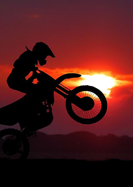 Motocross Rider Silhouette at Sunset