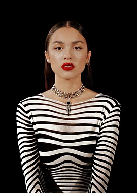 Olivia Rodrigo in Striped Top and Necklace