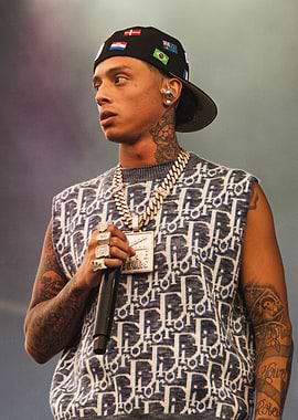 Rapper central cee with Dior-inspired vest and flag cap