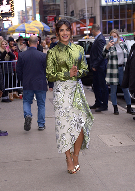 Priyanka Chopra Jonas in a floral skirt and green shirt