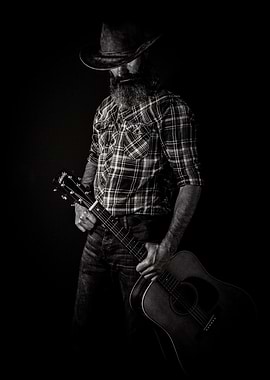 Man in Cowboy Hat with Guitar