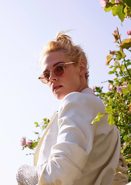 Kristen Stewart in White Blazer with Roses