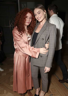 Margot Robbie and friend at event