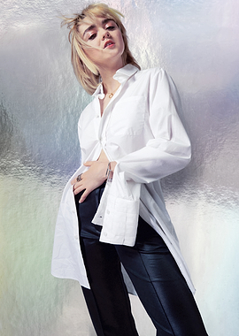 Maisie Williams in White Shirt and Black Pants