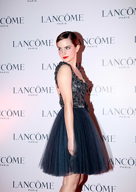 Emma Watson in a dark blue dress