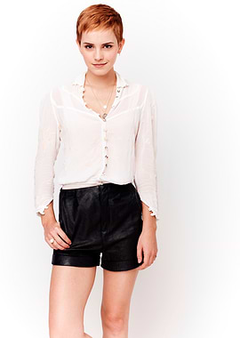 Emma Watson in white blouse and black shorts