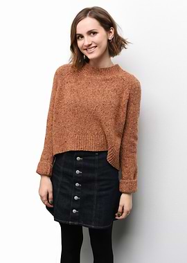Maude Apatow in Sweater and Denim Skirt