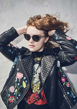 Shannon Purser in embroidered leather jacket