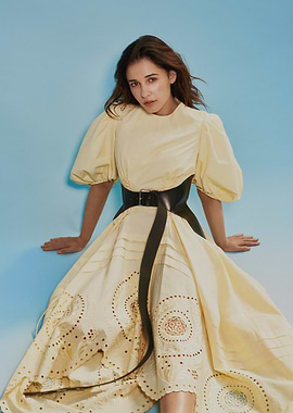 Naomi Scott in a yellow dress