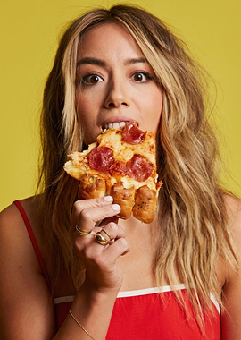 Chloe Bennet eating pizza with breadstick crust