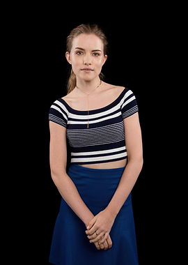 Willa Fitzgerald in striped crop top and blue skirt