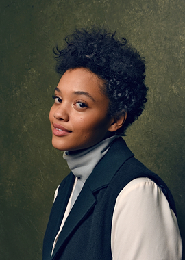 Portrait of Kiersey Clemons with curly hair