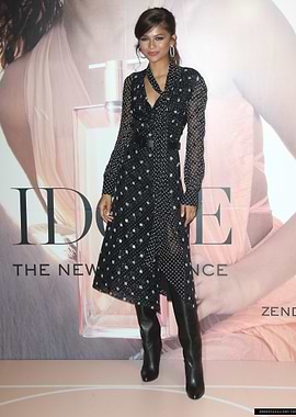 Zendaya in a polka dot dress and boots