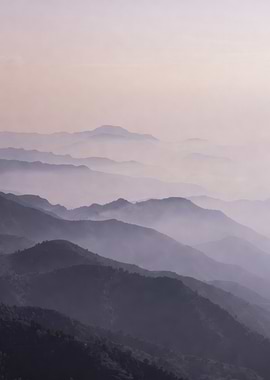 Misty Mountain Layers at Sunrise