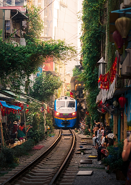 Train passing through a narrow street