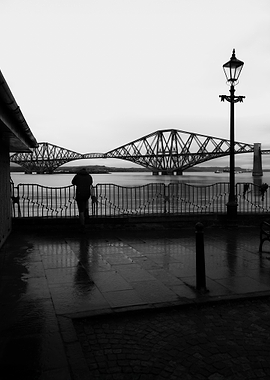 Person overlooking Forth Bridge