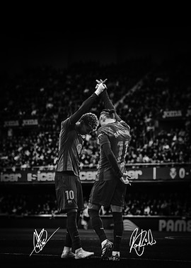 Football players celebrating with hands raised