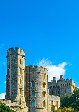 Medieval Stone Castle Tower Under Blue Sky – Historic Architecture Photography