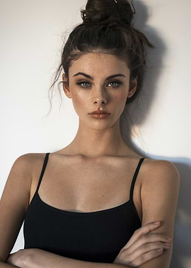 Meika Woollard with Messy Bun and Black Tank Top